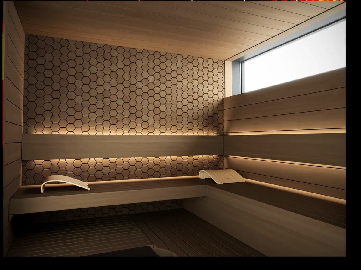 A sauna room lined with light hexagonal panels