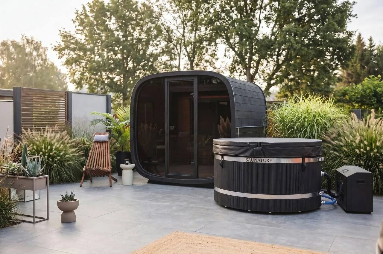 Outdoor pod sauna beside a round Saunature cold plunge and chiller